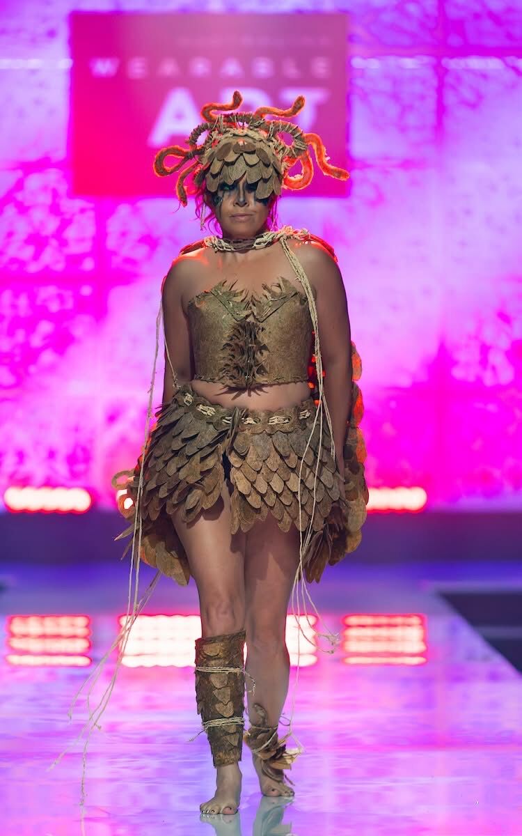 Alpha on the runway in a wearable art costume